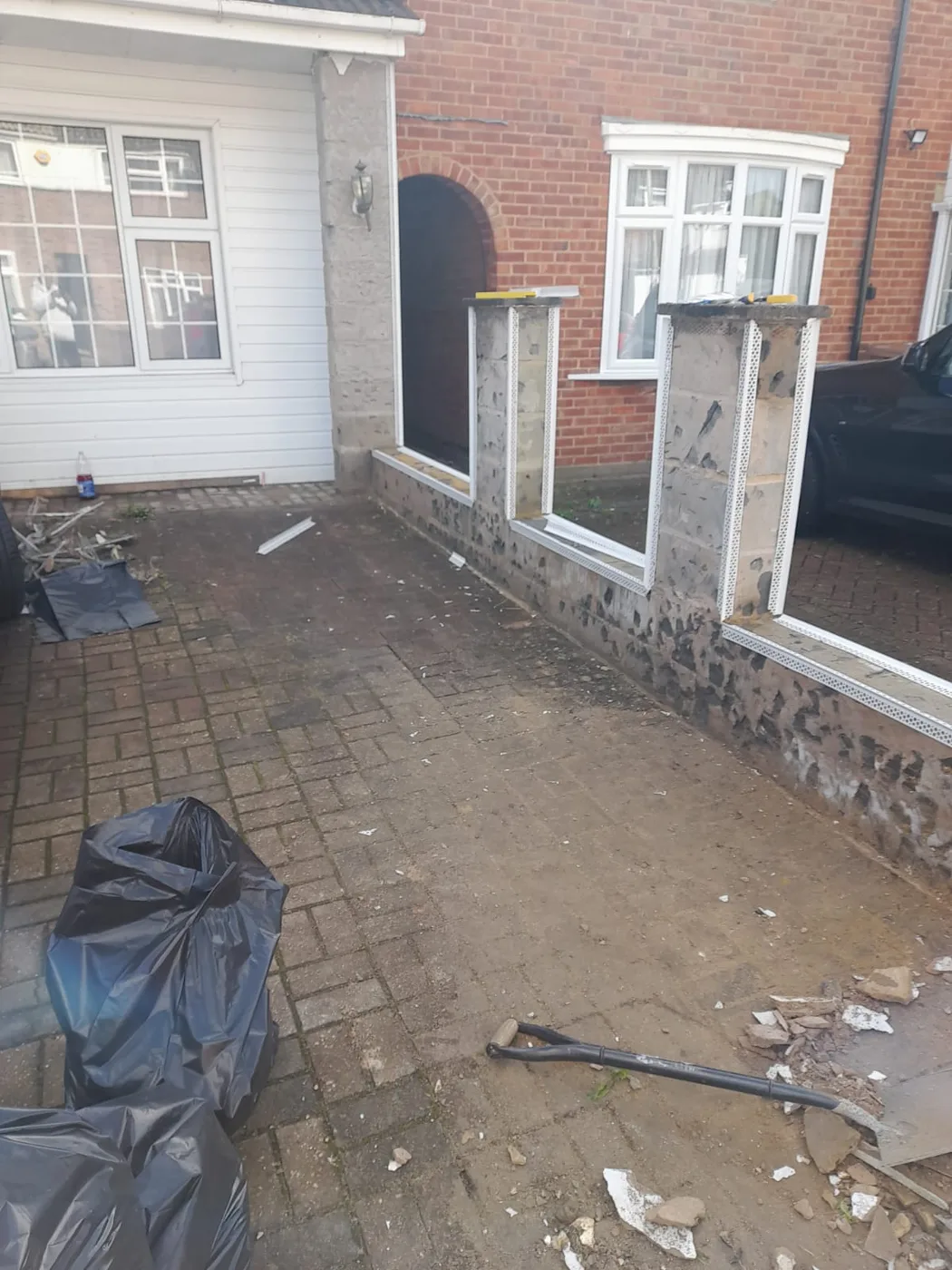 Driveway cleared and walls prepared for rendering